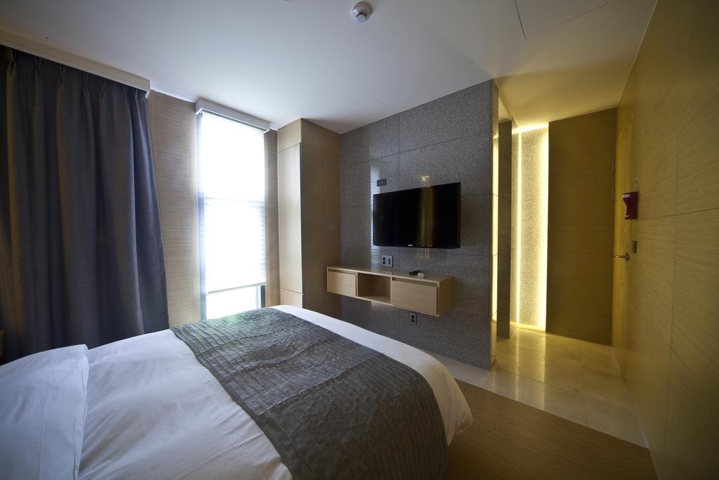 Stanford Hotel And Resort Τζέτζου Δωμάτιο φωτογραφία